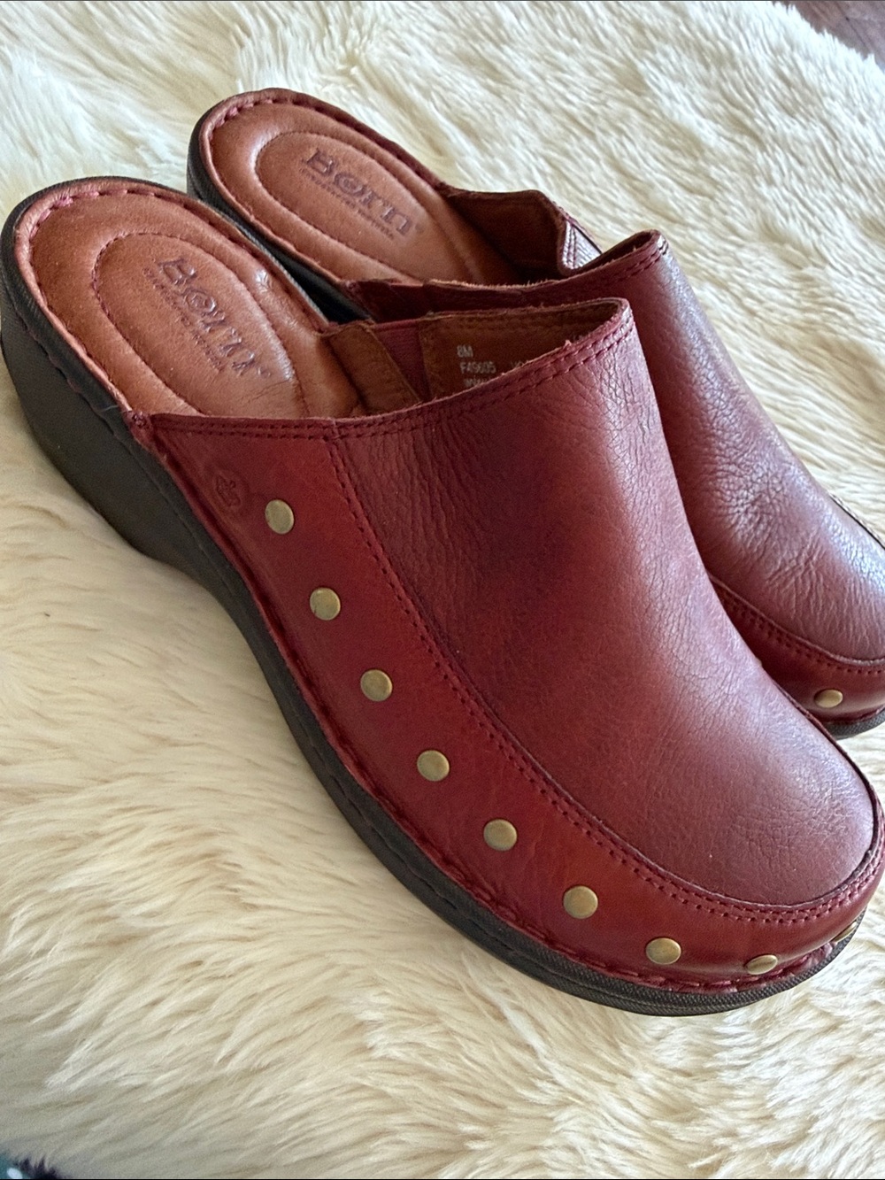 Born Shoes "Majesty" Studded Leather Clogs.